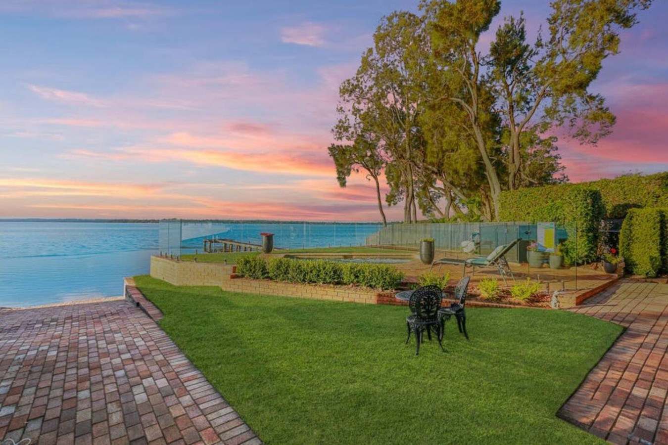 Tranquil backyard oasis overlooking the lake.