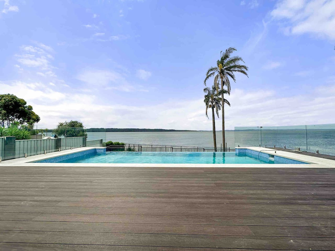 Enjoy a refreshing swim with a scenic lake view.