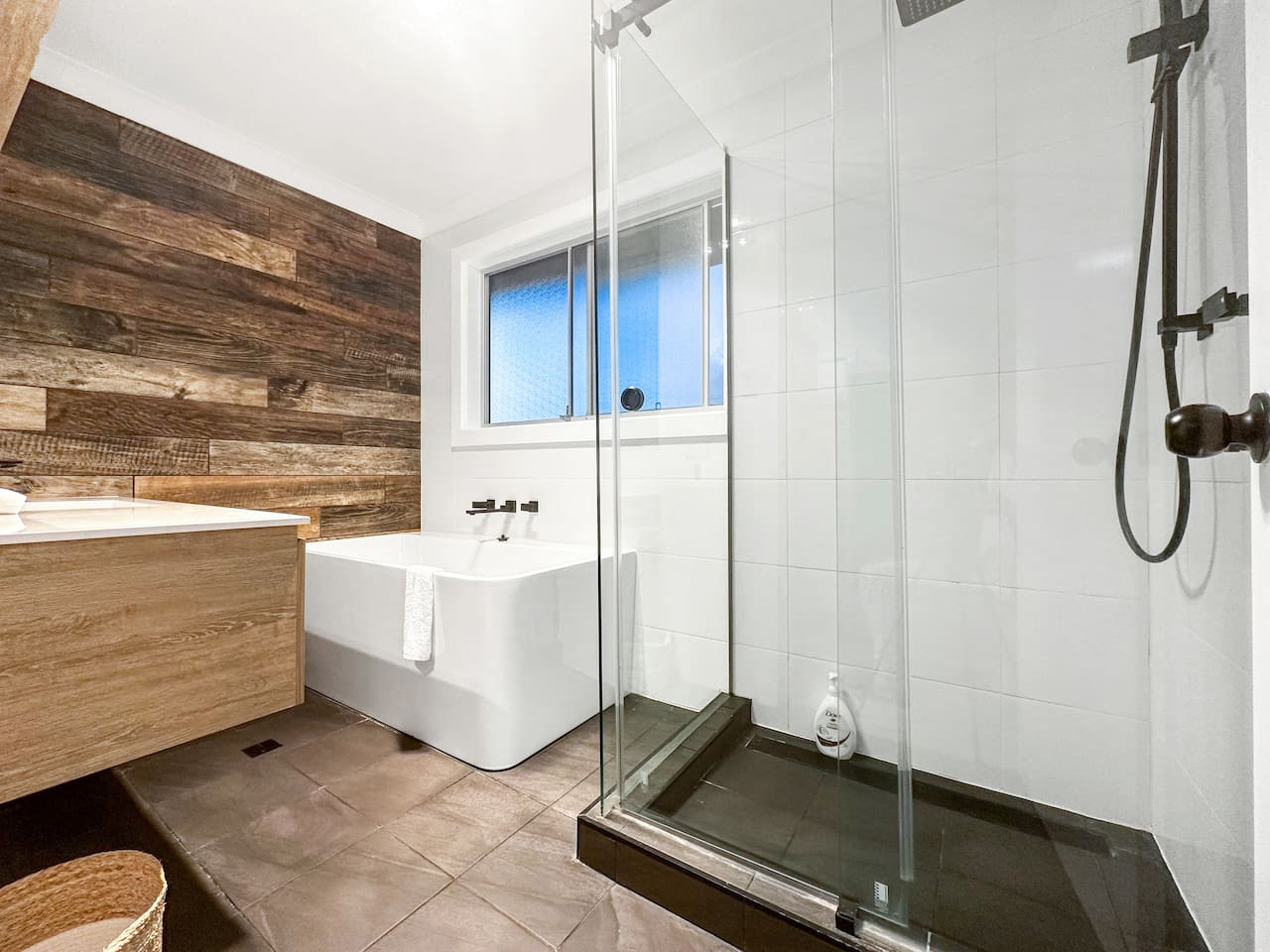 Indulge in relaxation with our full bathroom featuring a luxurious bathtub.