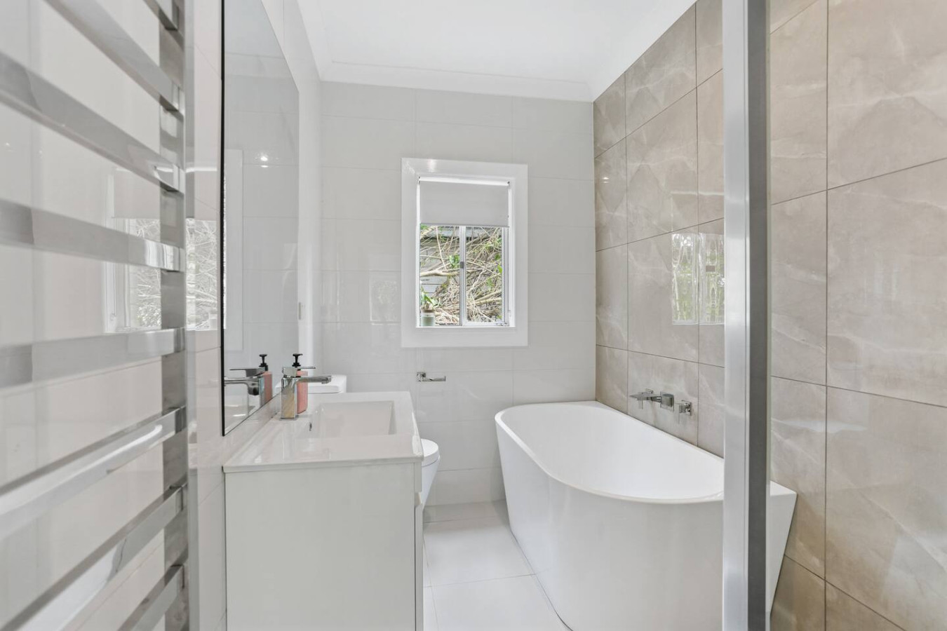 Unwind in our complete bathroom featuring a relaxing bathtub.