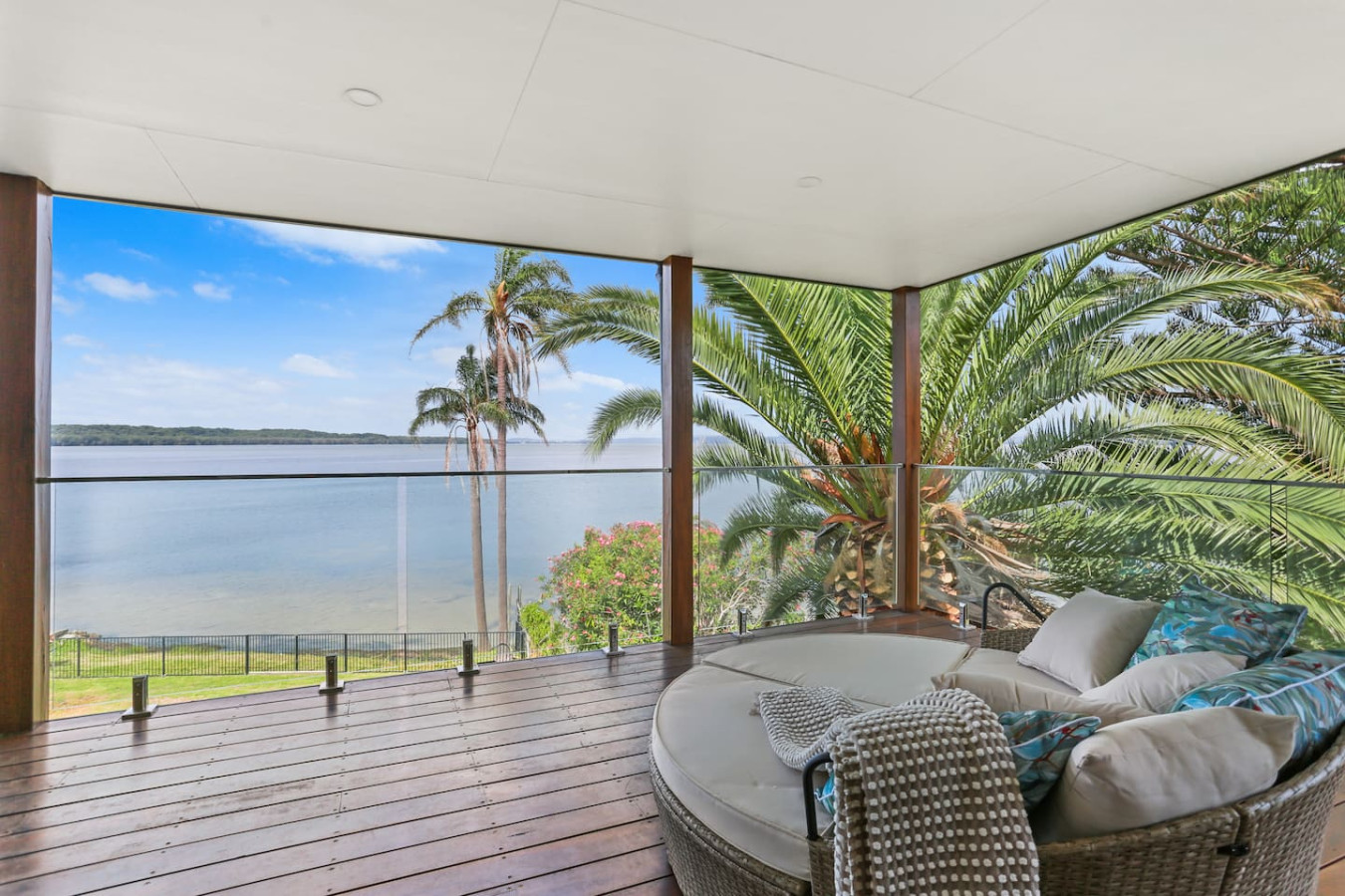 Enjoy tranquil lake views from our serene balcony.