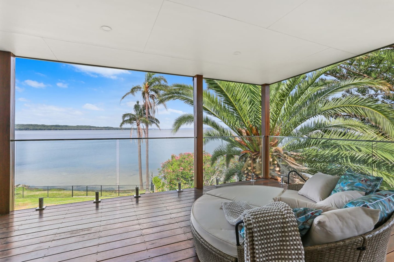 Enjoy tranquil lake views from our serene balcony.