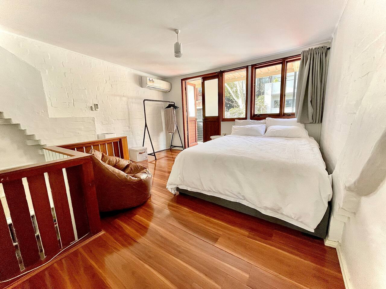 One of the four bedrooms for you to enjoy. Relax in fresh linen wrapped over a ONEBED X 12 inch medium plush mattress.