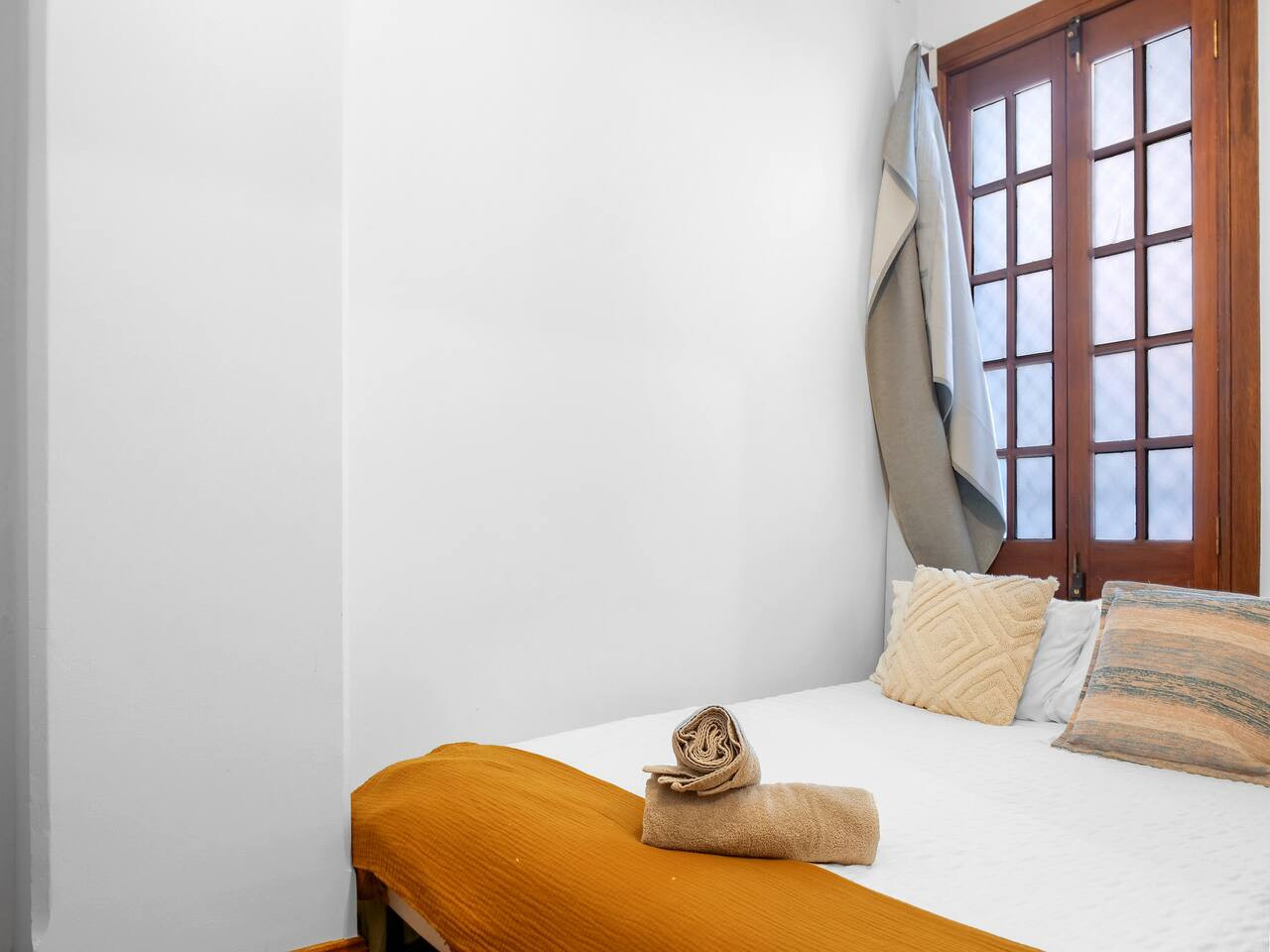 Rest easy in a bedroom with a queen bed.