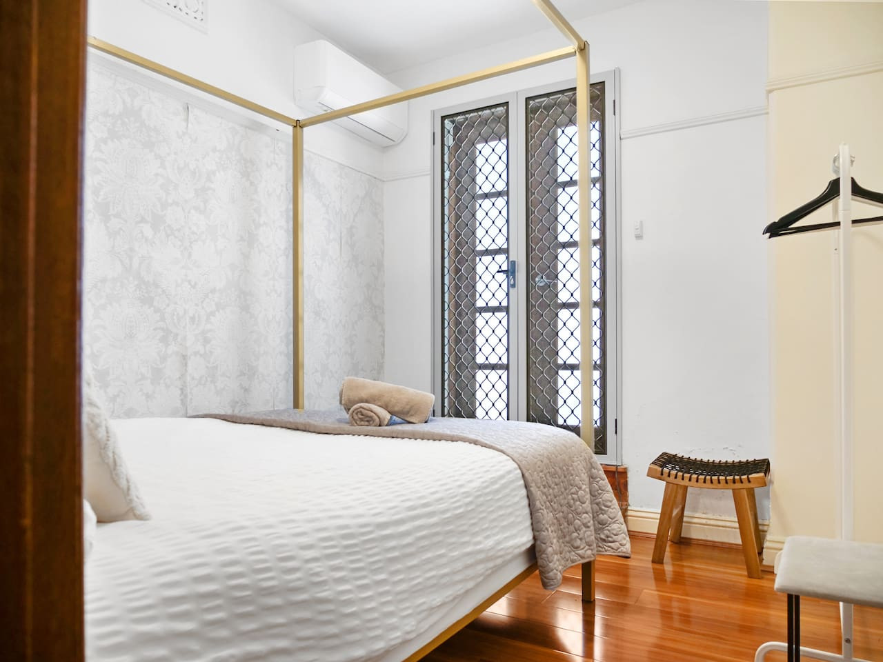 Rest comfortably in our cozy bedroom.