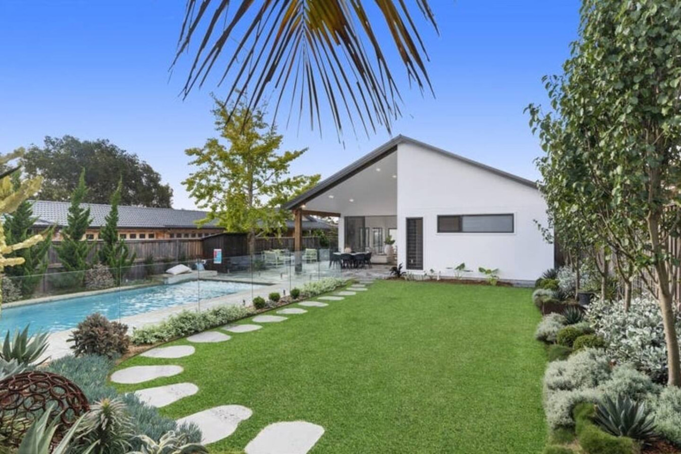 Pool, garden & patio in view. Your private oasis awaits. Click to book your escape!