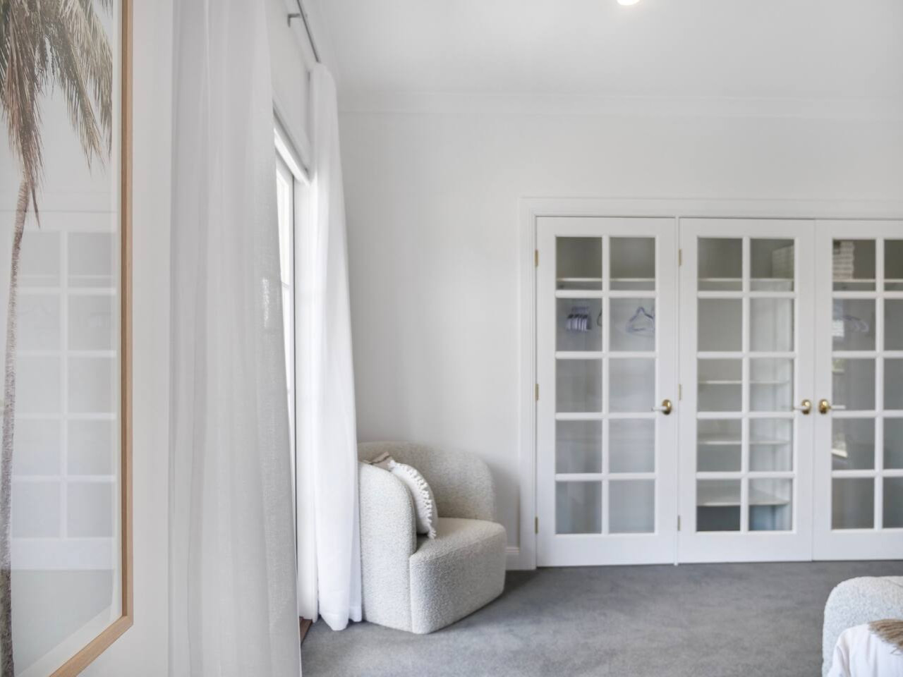 Transparent glass wardrobe for contemporary aesthetics.