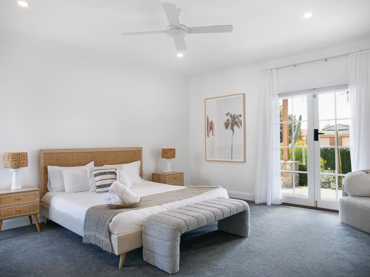 Main House Bedroom 1: 1x King
Serene bedroom sanctuary for relaxation. Elegant and spacious bedroom, complete with a glass door offering stunning views of the outside landscape.