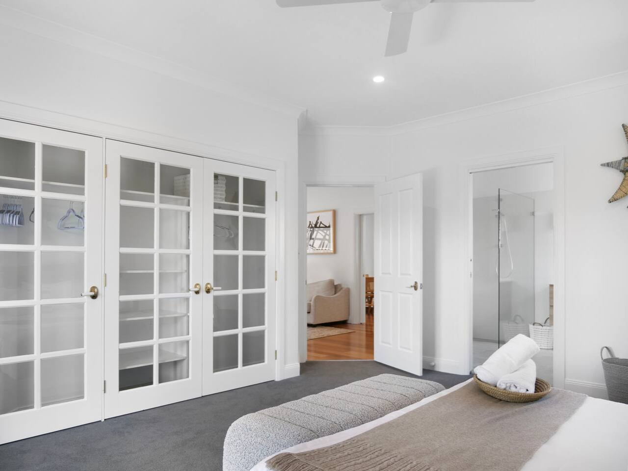 Luxurious closet wardrobe, featuring sleek glass doors that showcase your wardrobe essentials in style.