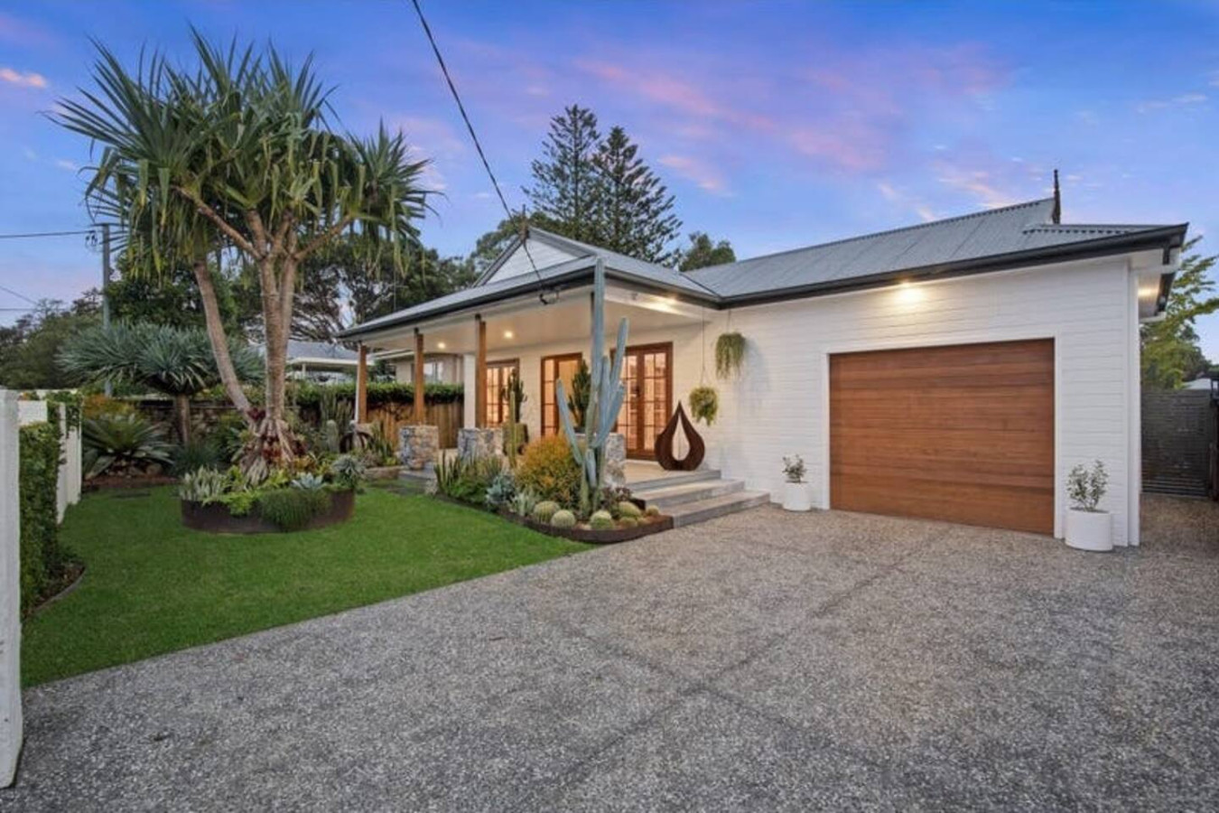 Main House: Stunning house surrounded by lush greenery. A welcoming sight! Click to explore.
