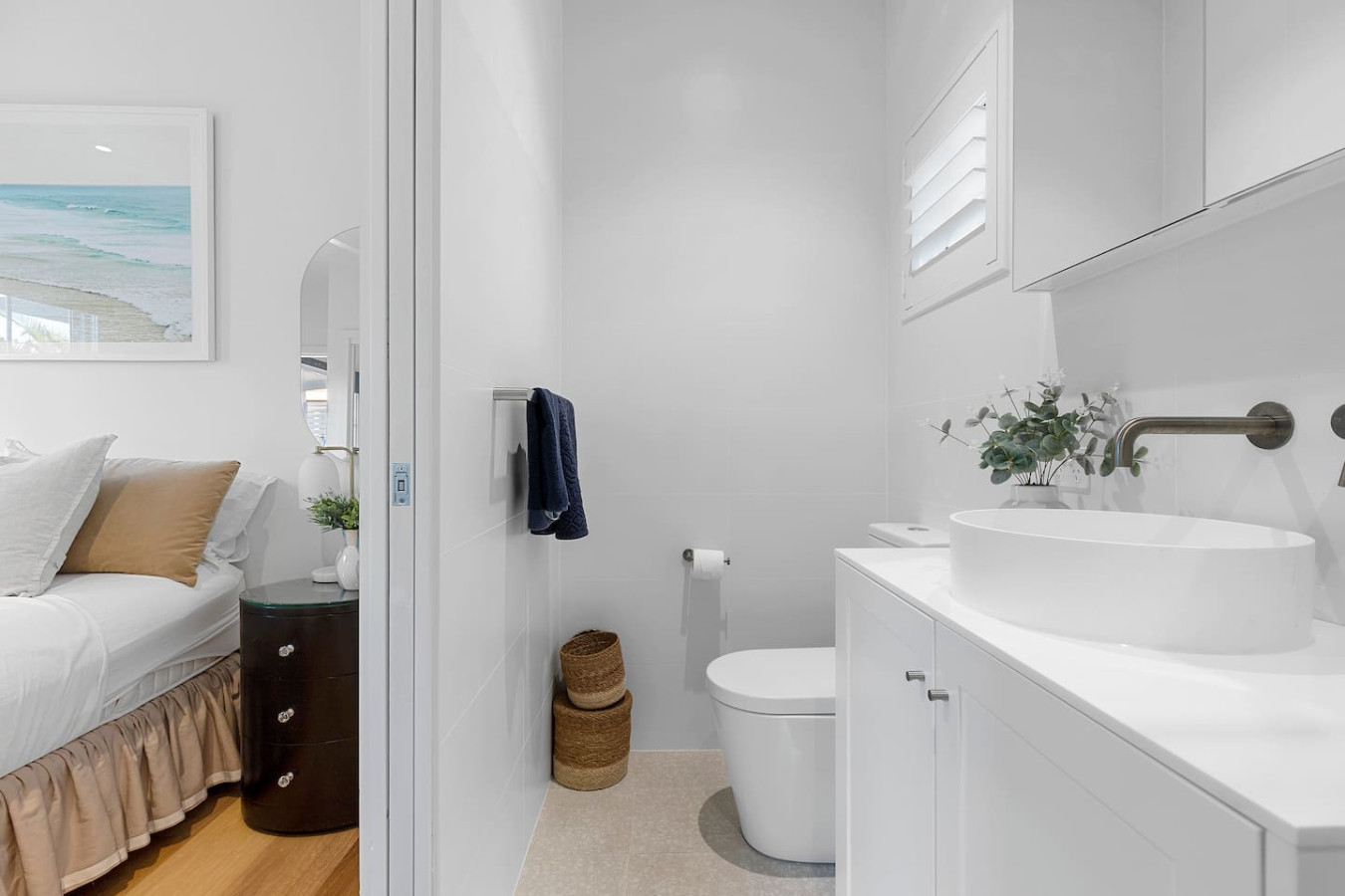 Freshen up in our sleek, compact bathroom. Reserve now!