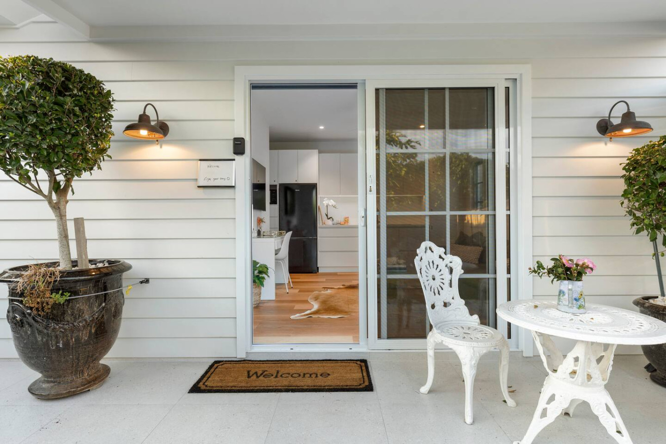Relax on our patio and take in the welcoming vibe. Ideal spot for morning coffee!
