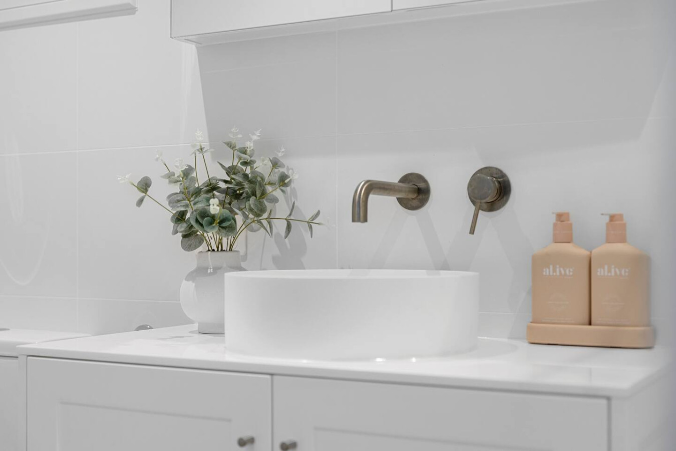 Stylish bathroom stocked with essentials for your convenience.