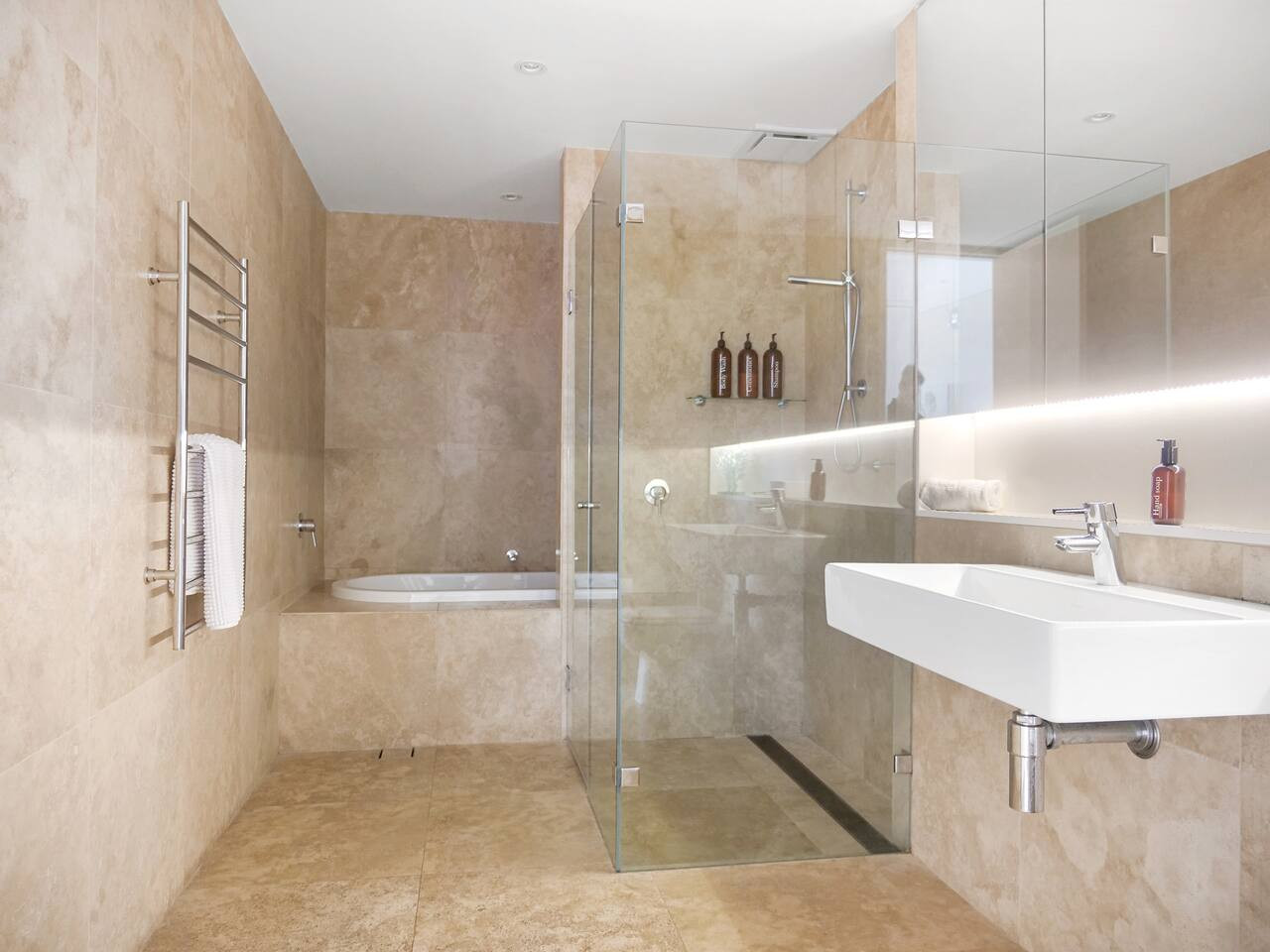 Soak away your worries in our spacious bathroom.