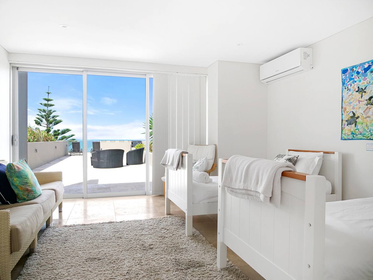 Sunlit room with 2 beds. Great for siblings or friends. Share laughs and stories. Your fun stay awaits!