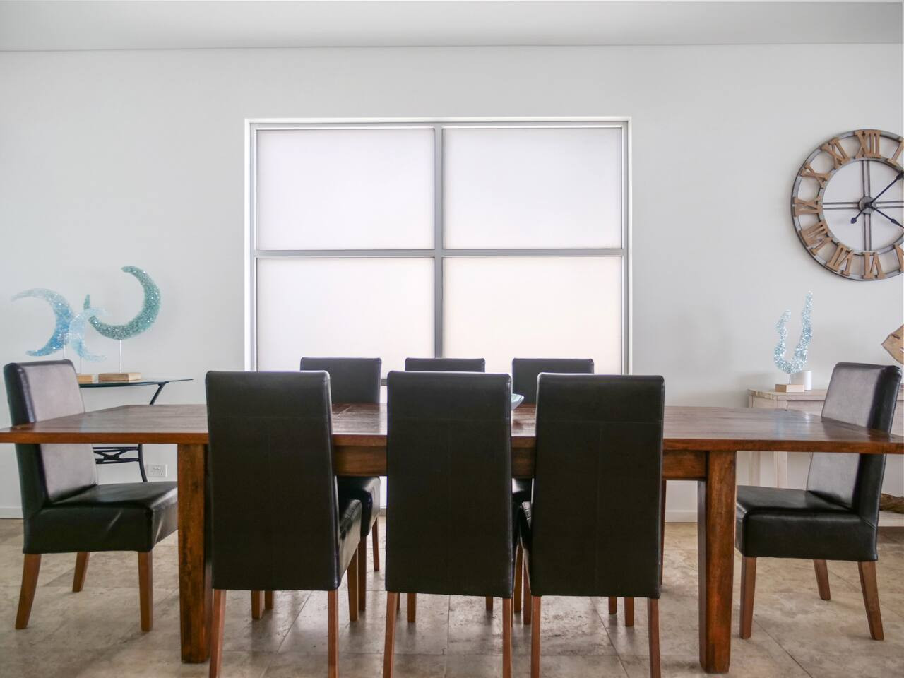 Elegant dining area accommodating up to eight guests.