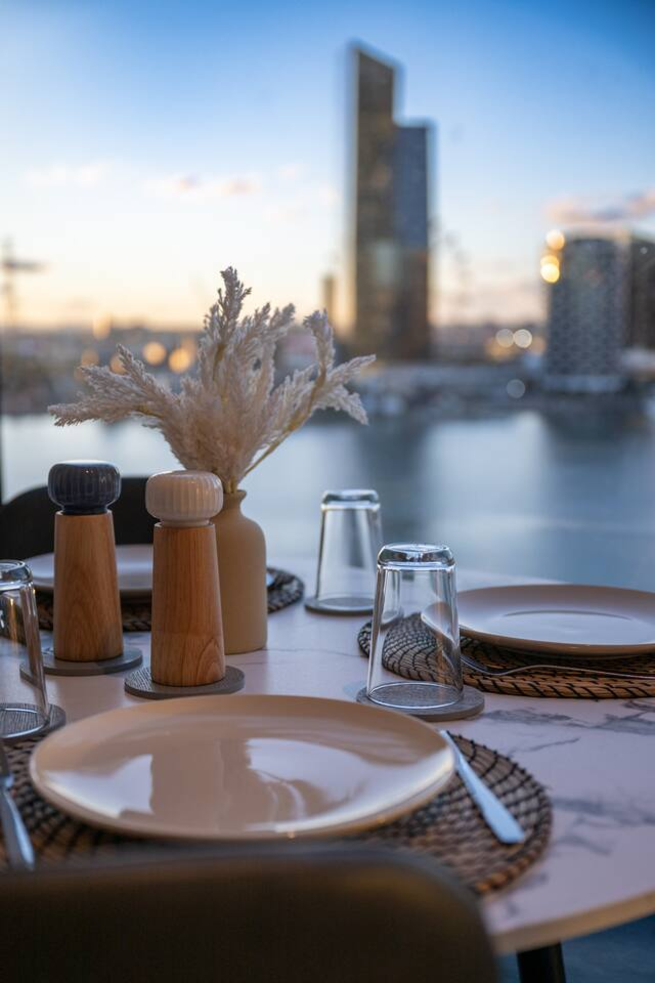 Dining with a stunning cityscape view.