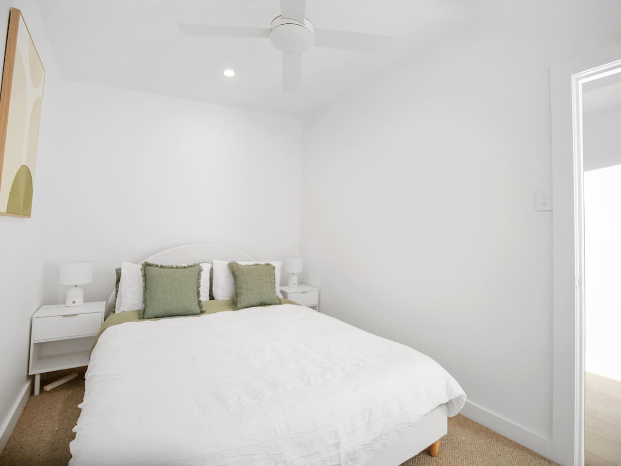 Cozy up in our bedroom with a double bed.