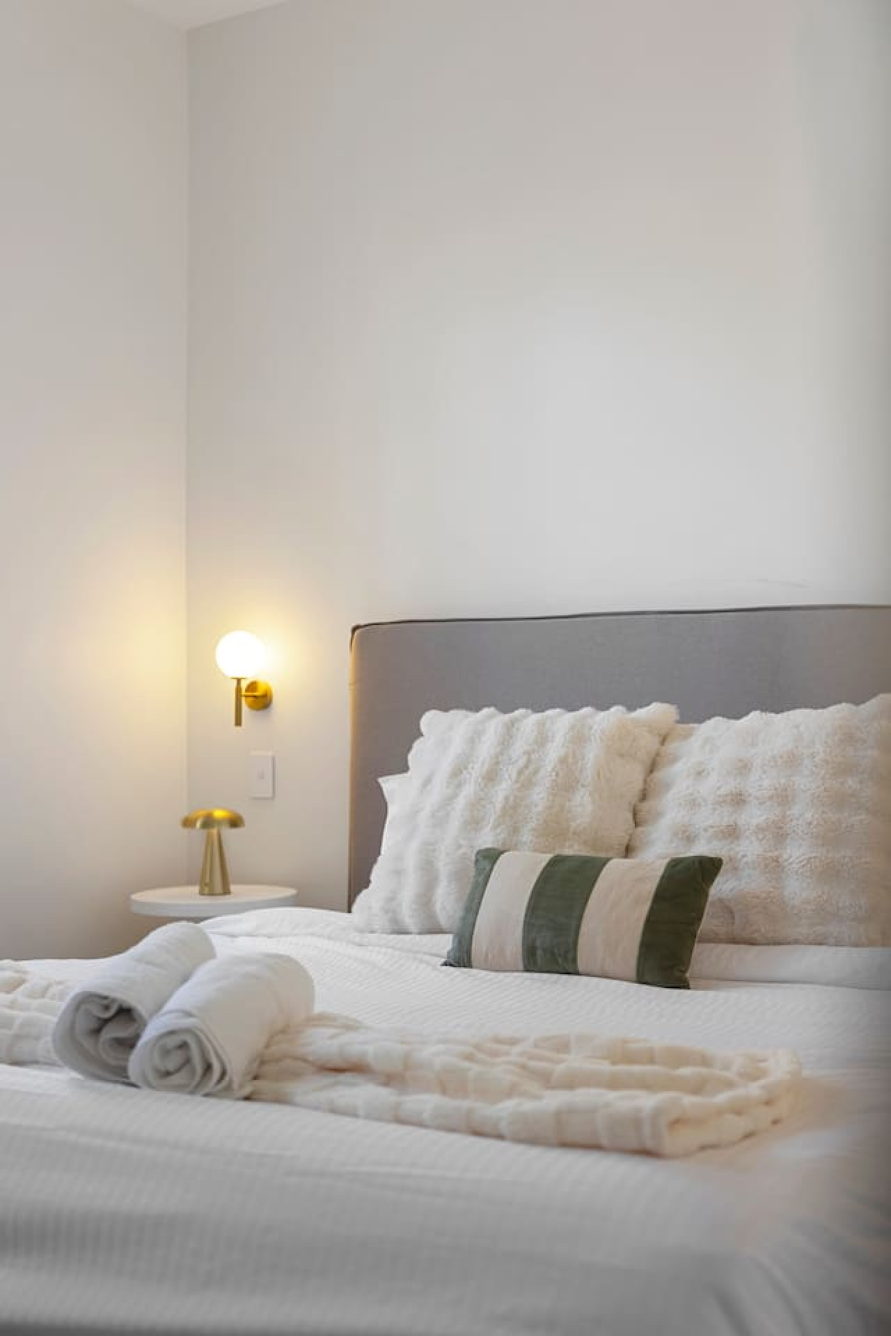 Bright and cozy retreat with a luxurious king-size bed, natural light, and stylish decor. Perfect for a relaxing stay! By Superhostly
