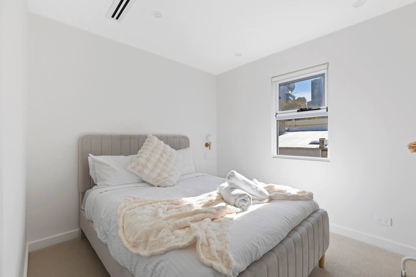 Cozy double size bed with plush bedding, soft lighting, and a peaceful ambiance for a restful stay. By Superhostly