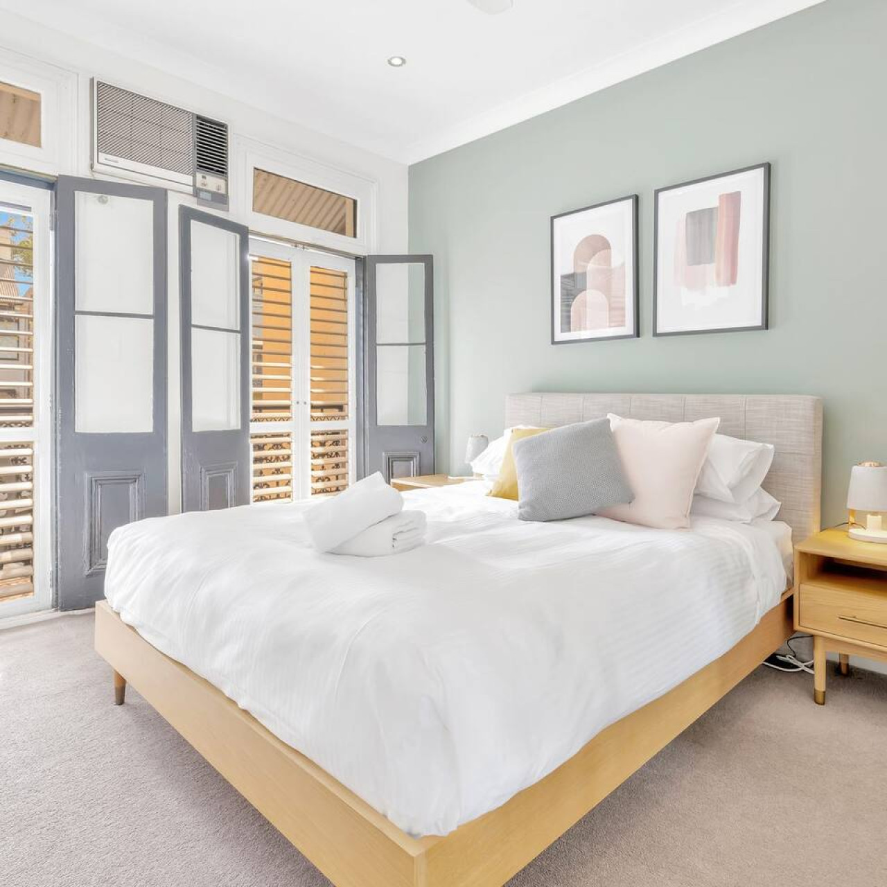 Peaceful master bedroom with balcony access and natural light – By Superhostly