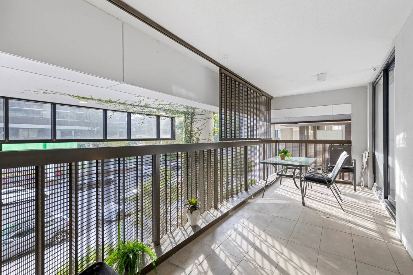 Step onto the airy balcony perfect for morning coffee or evening wine under the sun. By Superhostly