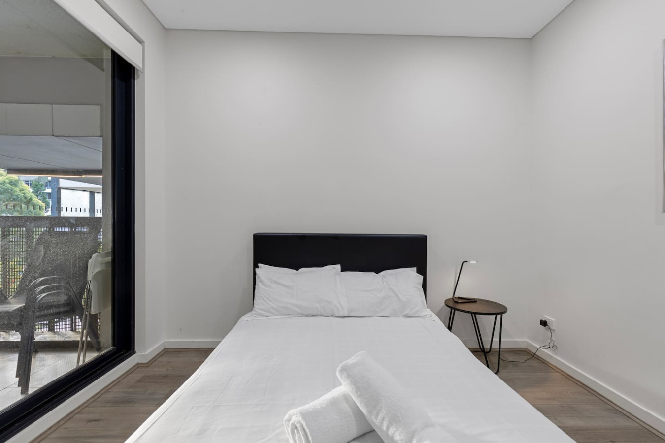 Wake up to a private balcony view right from the comfort of your bed. By Superhostly