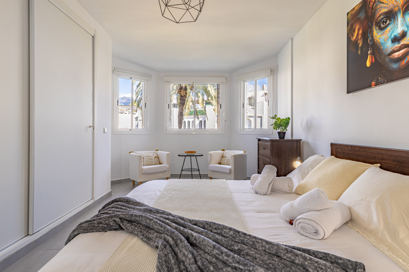 Master bedroom with king size bed and en-suite bathroom