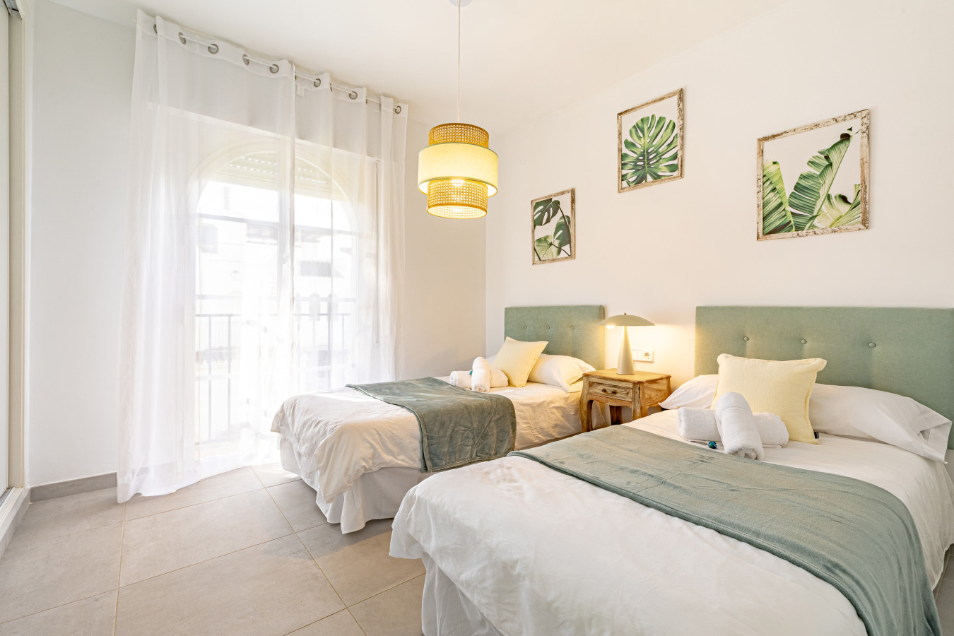 Third bedroom with twin beds and private balcony