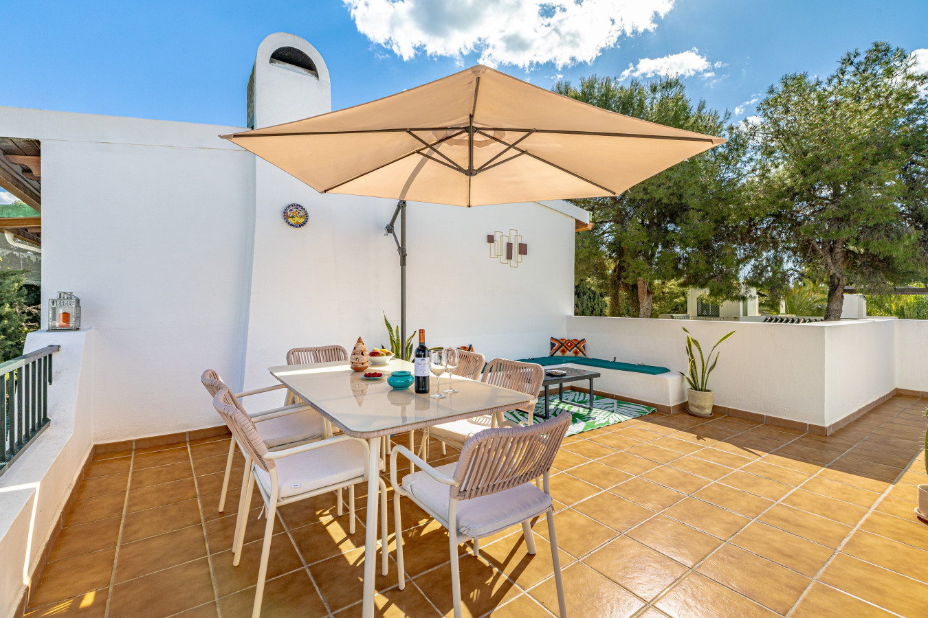 Rooftop terrace with dining area and BBQ