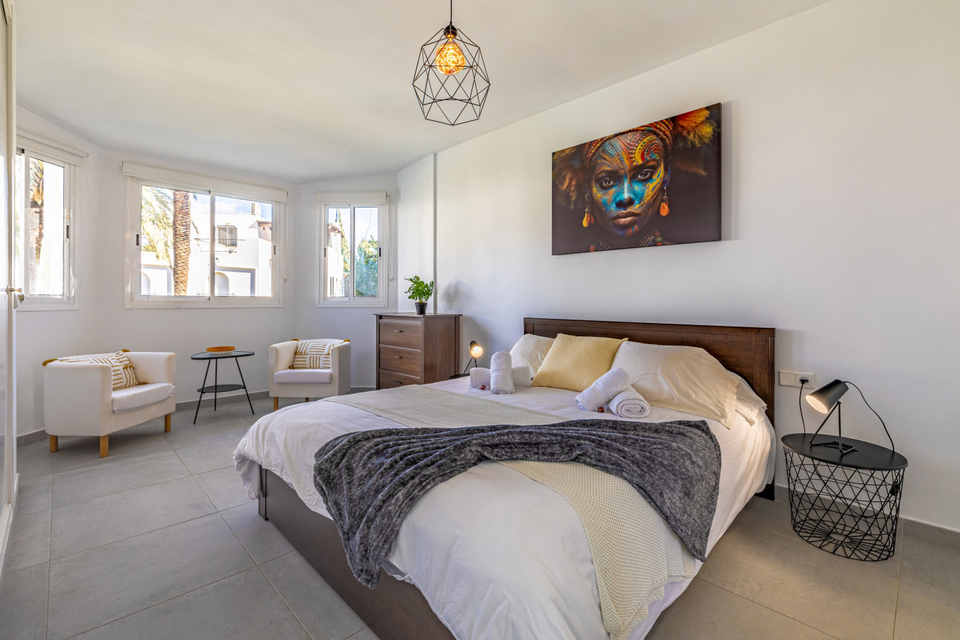 Master bedroom with king size bed and en-suite bathroom