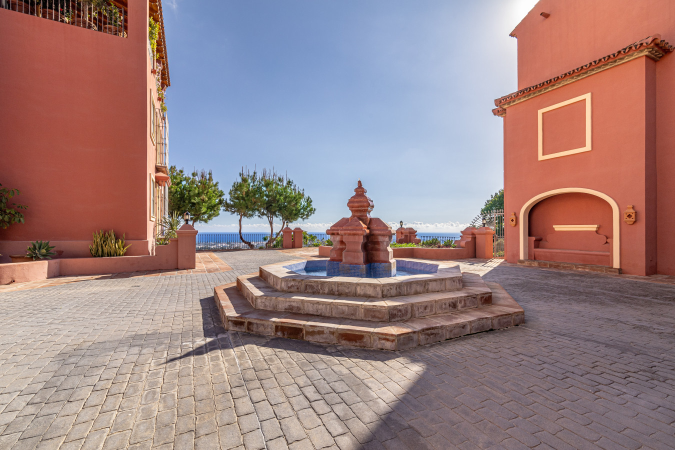 Open courtyard with fountain and panoramic views