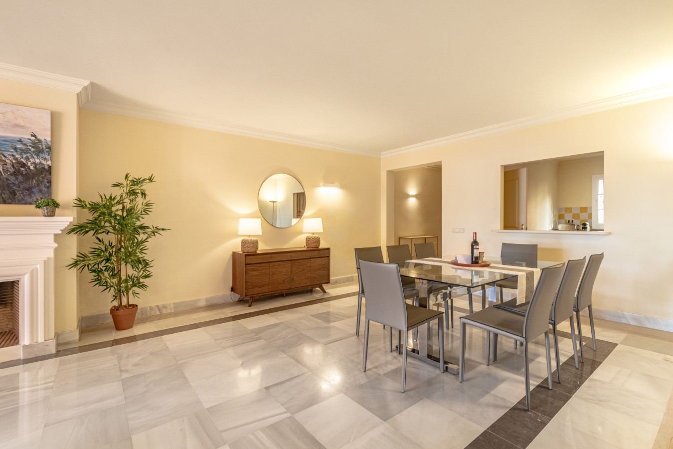 Large living room with chimney, Smart TV, seating area, dining area, French windows leading to the terrace
