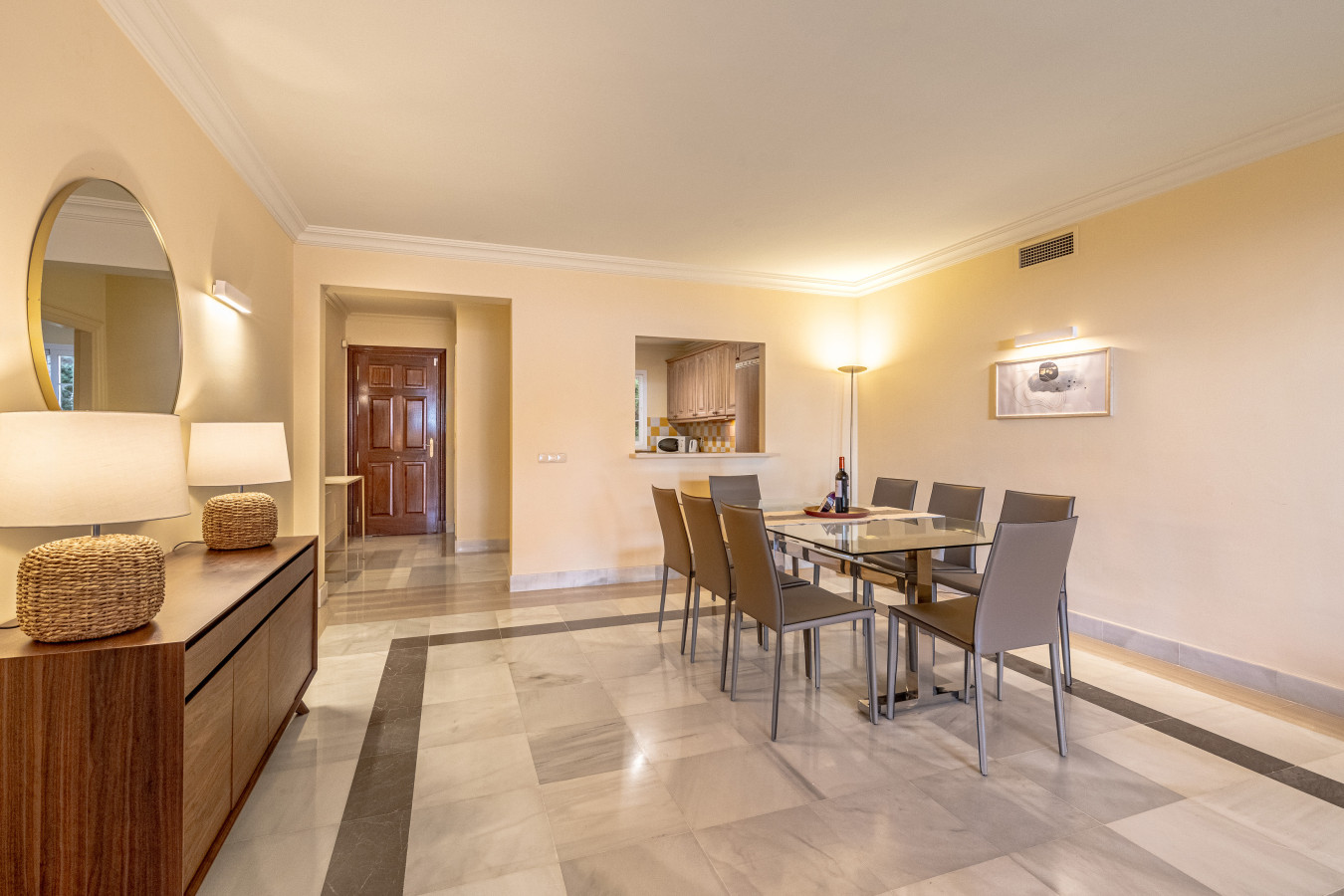 Large living room with chimney, Smart TV, seating area, dining area, French windows leading to the terrace
