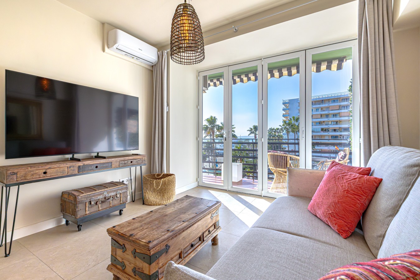 The bi-fold windows fold right back, opening the living room onto the terrace