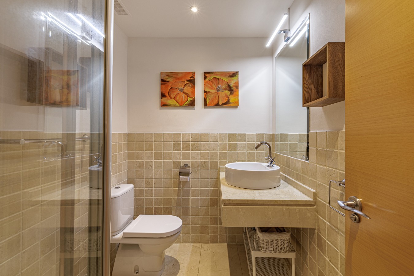 Second bathroom with walk-in shower, off the hallway between the bedrooms