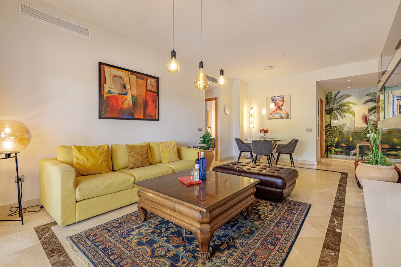 Living room with marble floors, Smart TV and central air conditioning