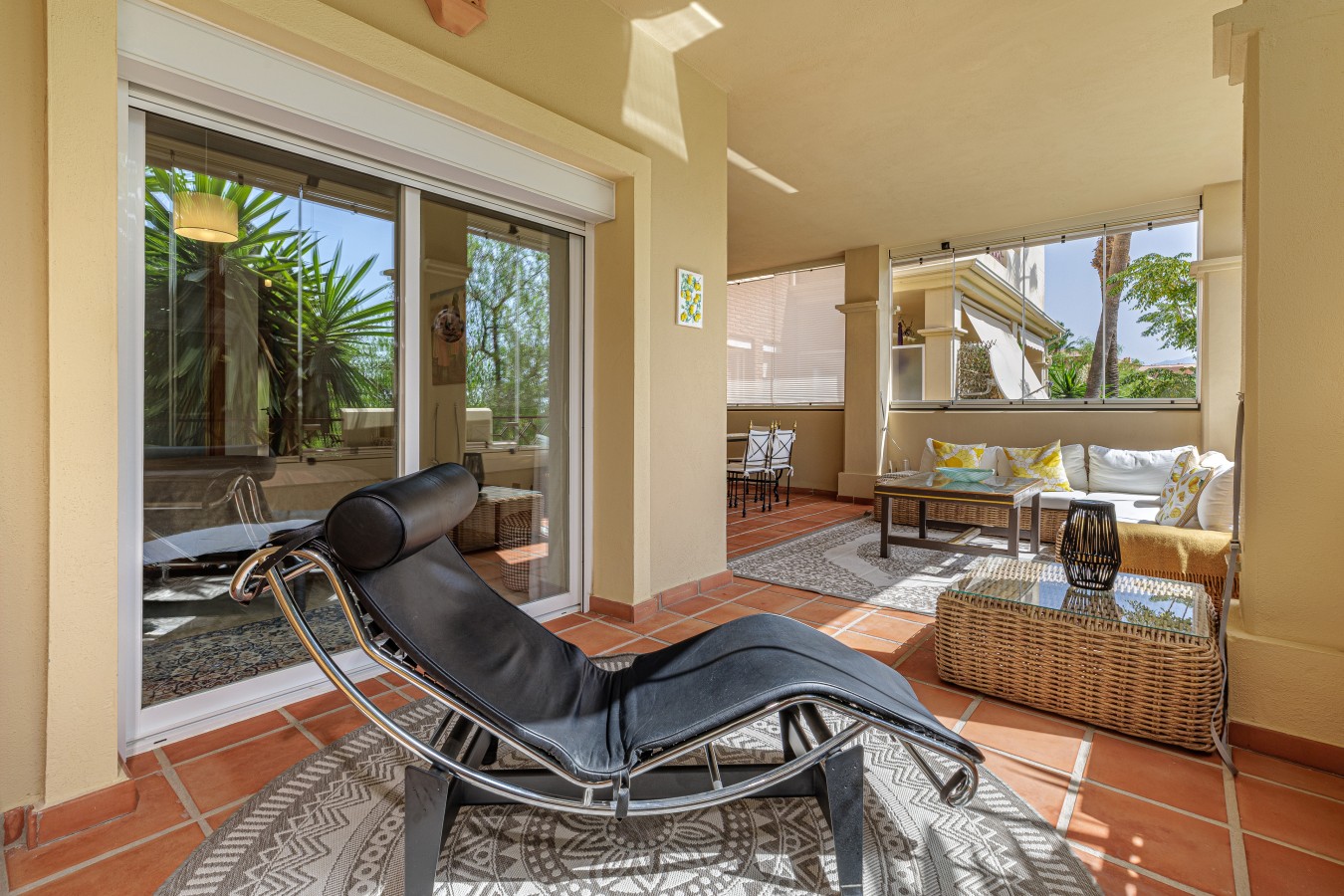 Terrace with sun lounger, opening off the living room