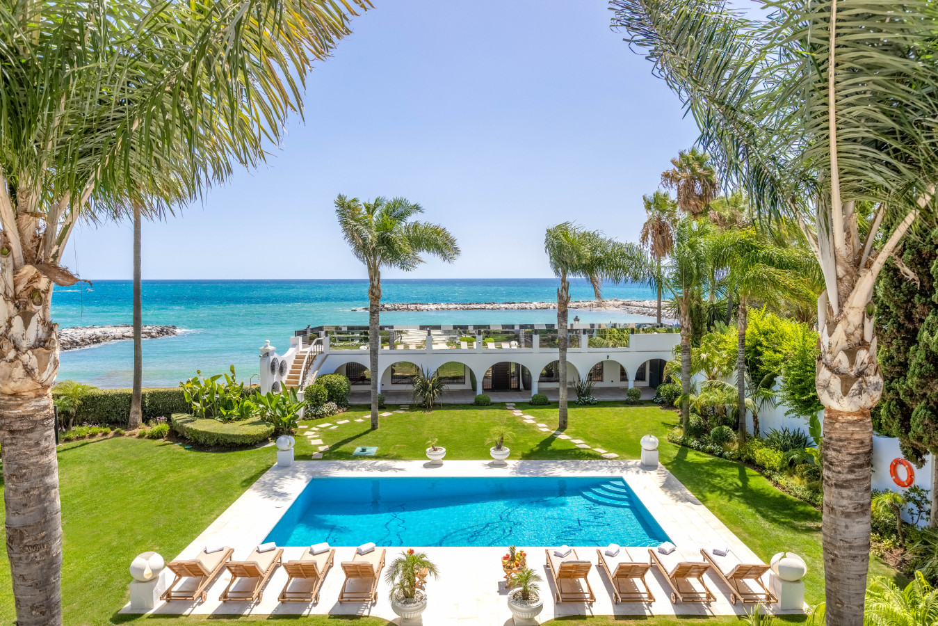 Picasso pool and garden with open sea views
