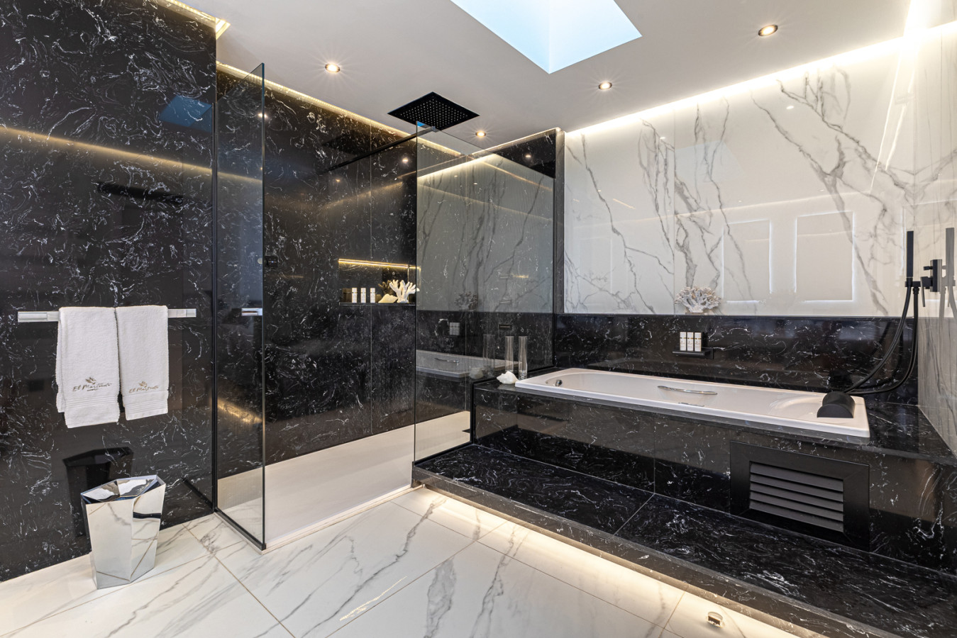 Master bedroom second en-suite bathroom with bath and shower