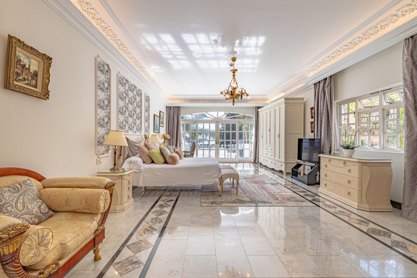 Second bedroom with en-suite bathroom, terrace, sea views, and barber room
