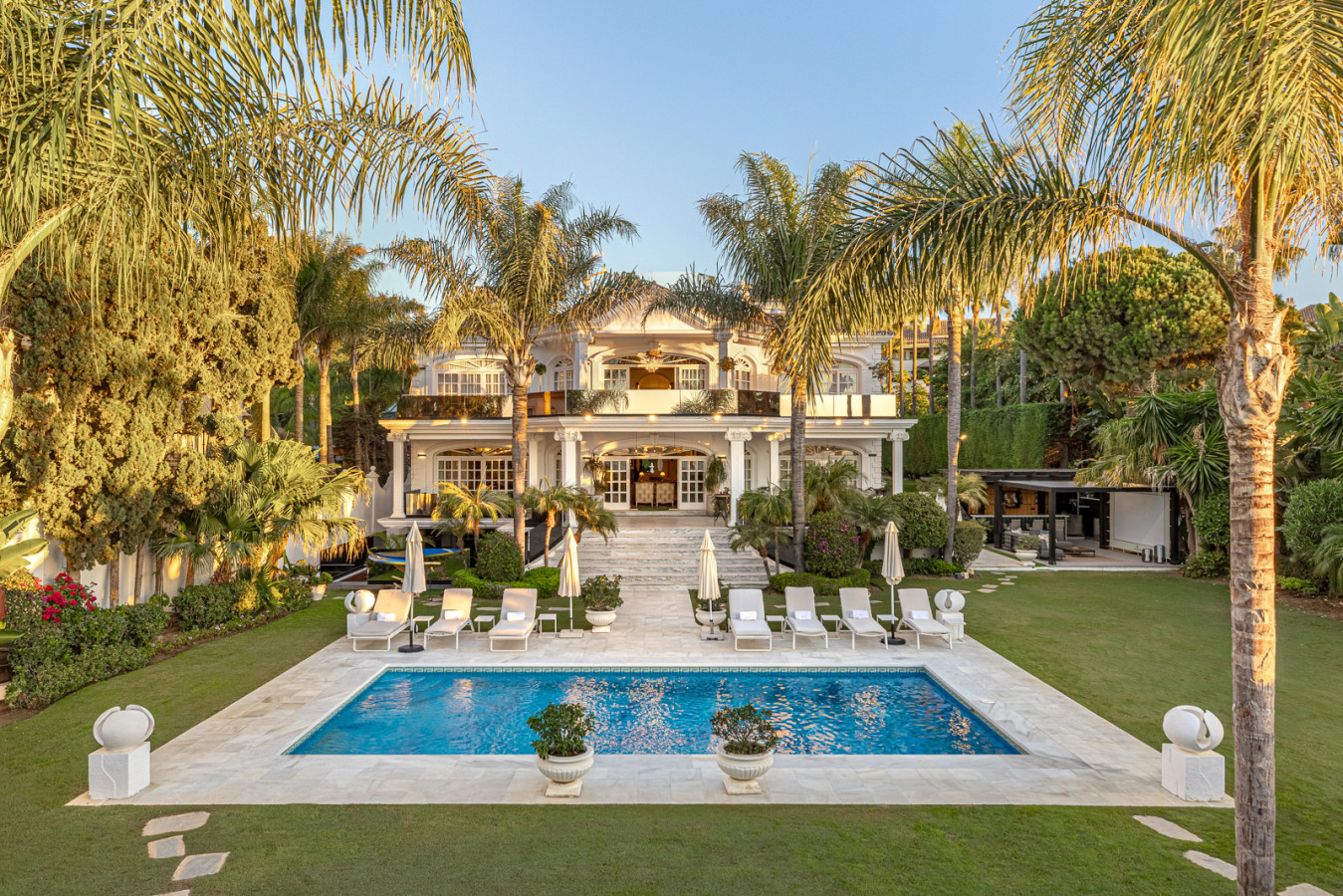 Villa El Martinete facade, pool, and garden