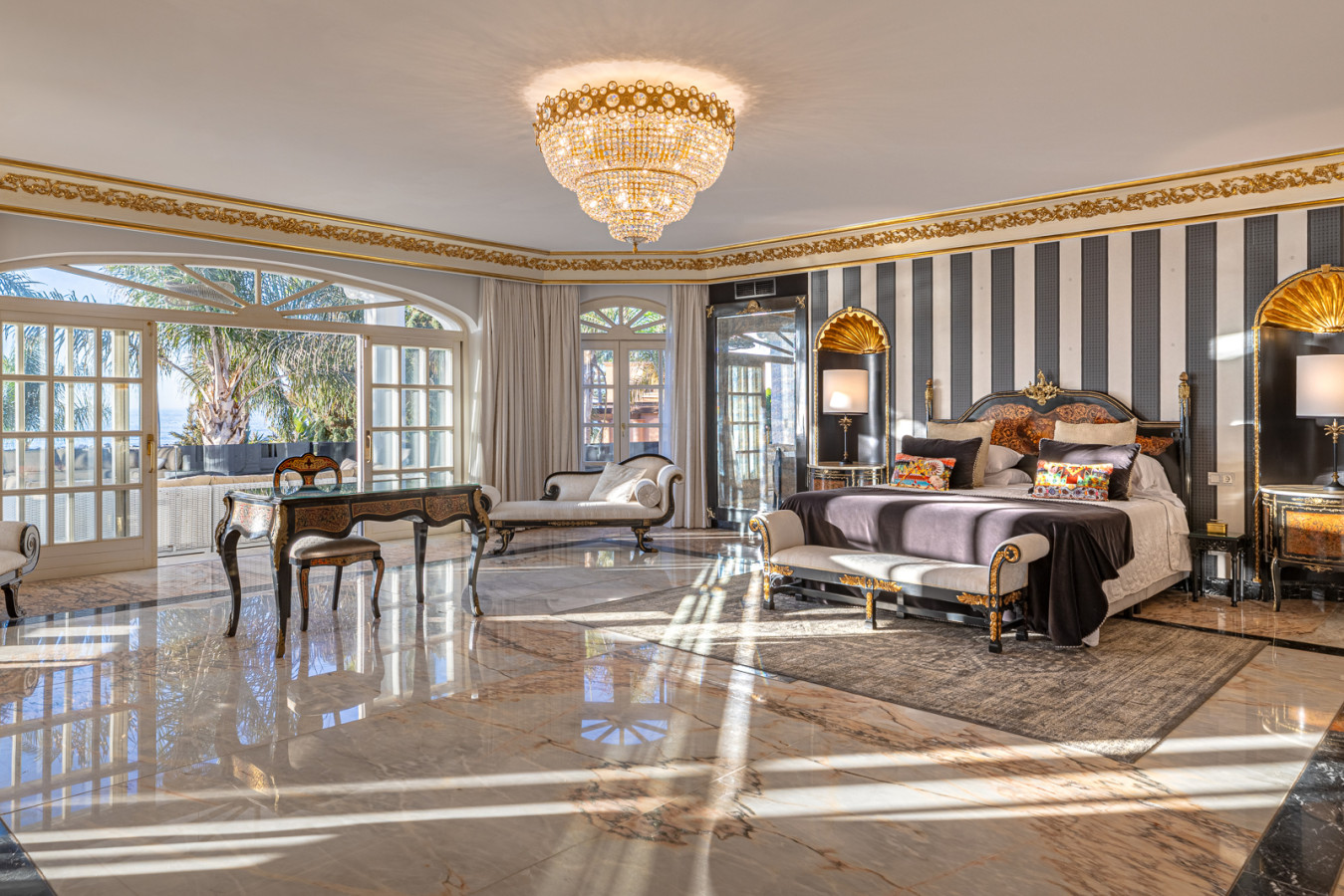 Master bedroom with two en-suite bathrooms, terrace, sea views, chimney, and dressing room