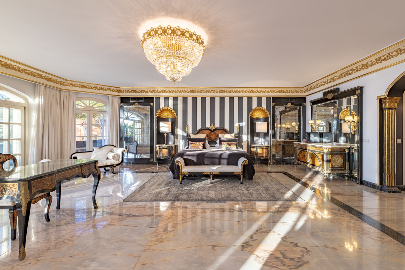 Master bedroom with two en-suite bathrooms, terrace, sea views, chimney, and dressing room