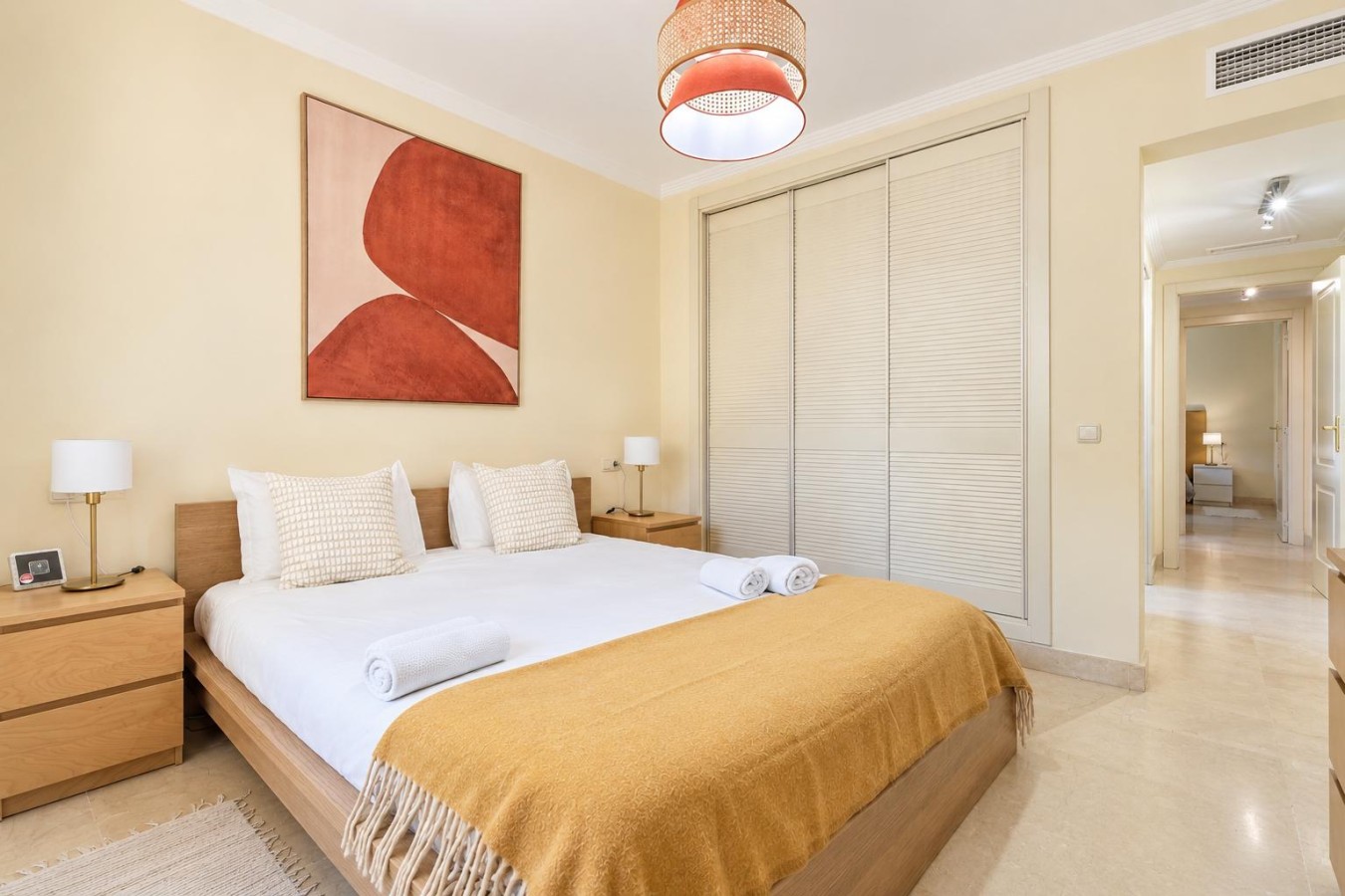 Master bedroom with fitted mirrored wardrobes