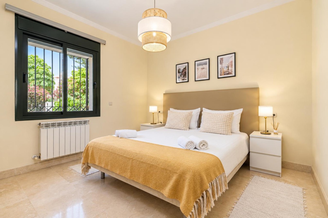 Second bedroom with double bed and garden views