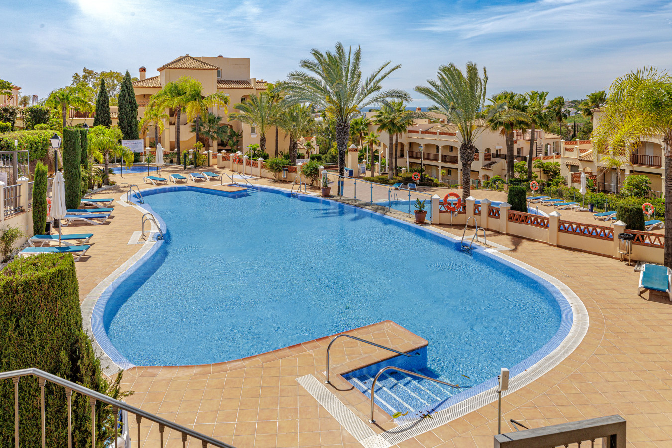 Main Resort Pool, Wide: Elevated view of the sprawling outdoor pool complex, central to your vacation.