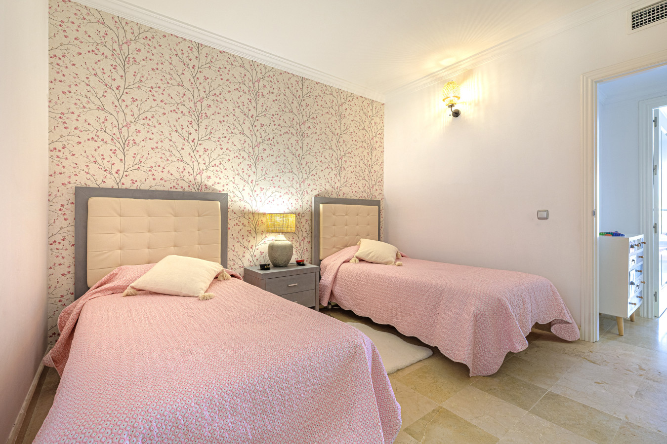 Wide Second Bedroom View: Comprehensive look at the spacious second bedroom, perfect for a restful night’s sleep.