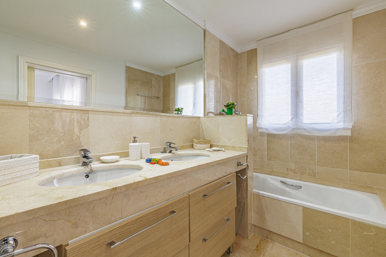 Second Bedroom (Twin Beds): Two comfortable twin beds make this a versatile space, ideal for families or friends.
