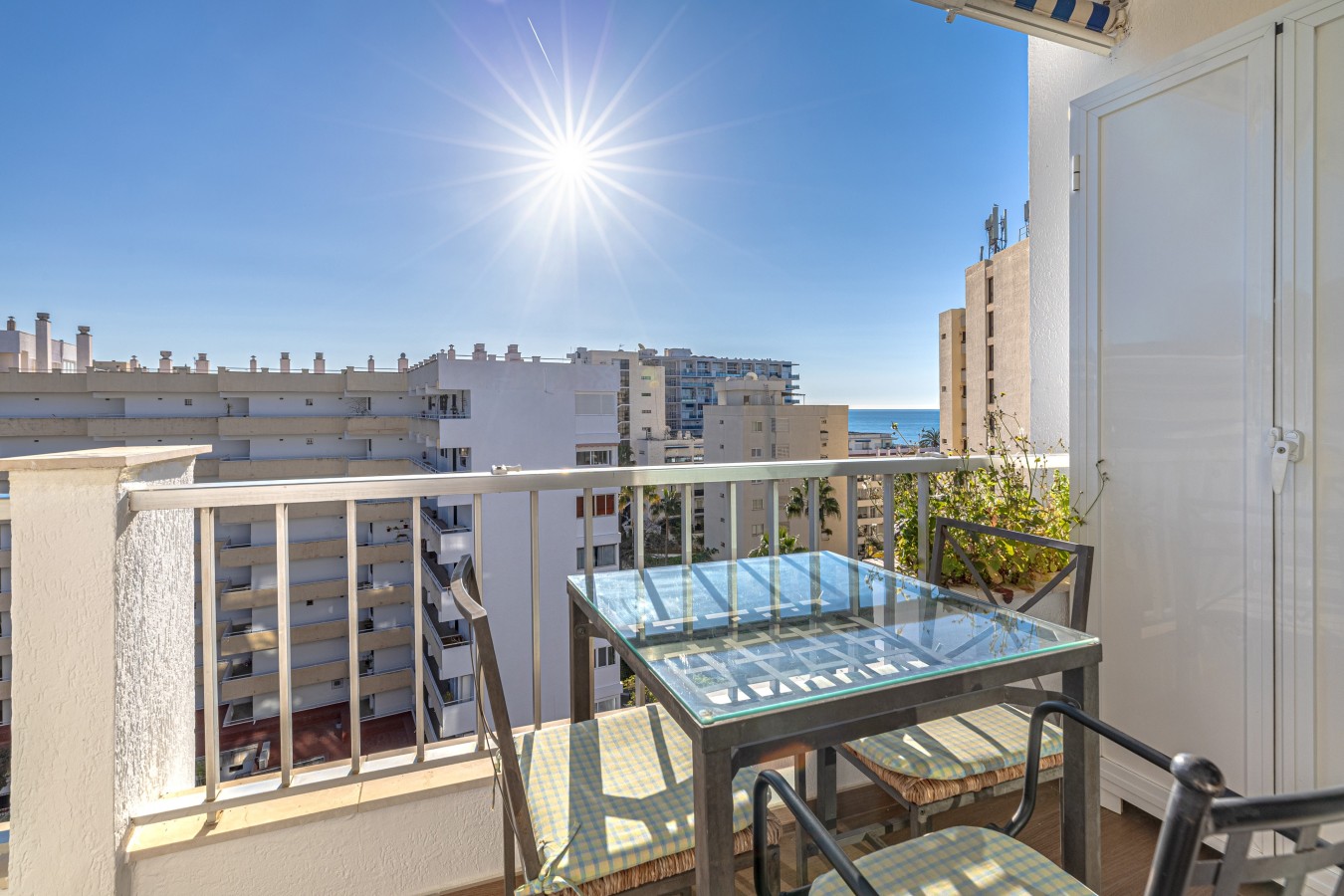 The terrace catches the sun through the day